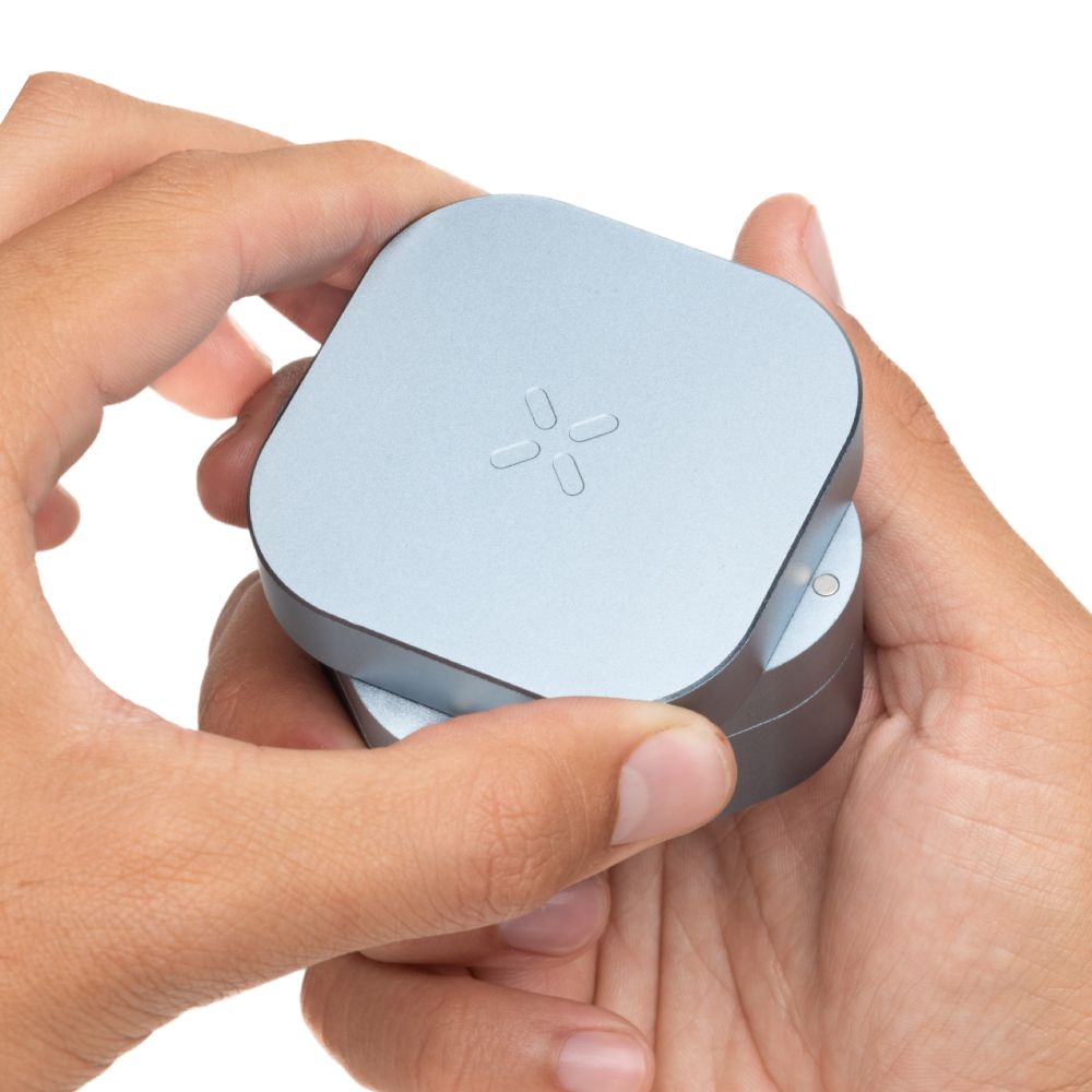 PAX Grinder Blue Haze size in hand