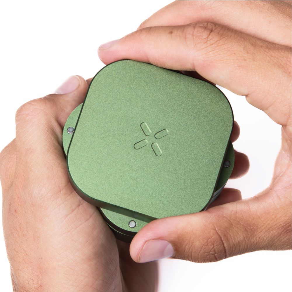 PAX Grinder Greenstone size in hand