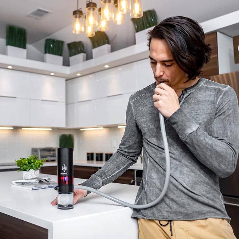 HITOKI The Trident 2.0 Laser water pipe in use